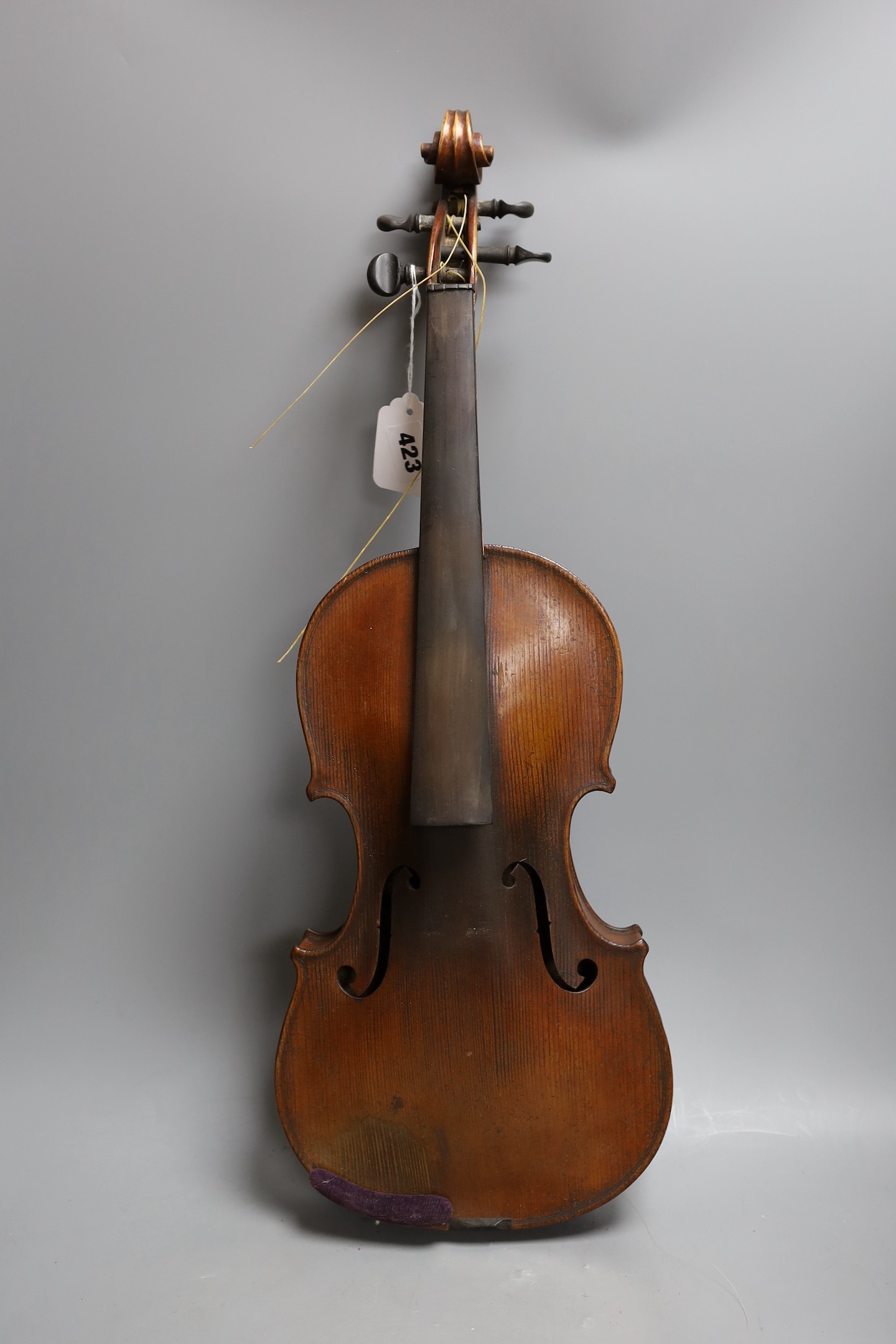 A cased 19th century violin, labelled Stradivarius 1690, with a Dodd bow